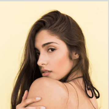 Happy Lovebird client smiling after finding a match through our professional dating service